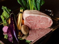 Dinner course featuring Kyushu Wagyu beef and grilled vegetables