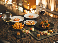 [Dinner Party Plan / 2 hours of free flow included] A five-course shared meal featuring seasonal winter dishes, including pasta with vibrant winter vegetables and a main dish.