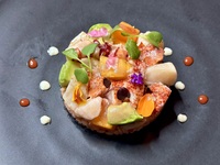 A special Christmas dinner at an authentic New York steakhouse featuring 6 dishes including a 21-day aged Black Angus beef rib steak