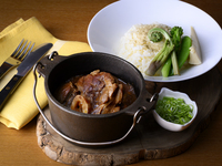 Osso buco simmered slowly with cherry tomatoes from Hakuba