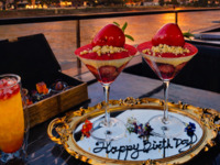 [Twilight Plan - Reservations only for 5 PM or 5:30 PM] Celebrate the start of night with a special Rouge Parfait. Anniversary plan includes a book of appetizers and cocktails.