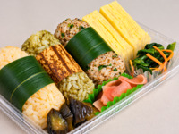 Bamboo-wrapped onigiri bento